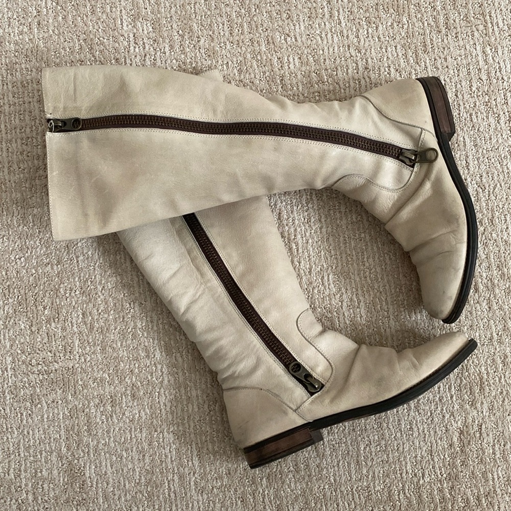 Steve Madden cream boots.